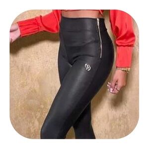 ODOLLS Collection size 4 black leather look skinny trousers with gold zippers